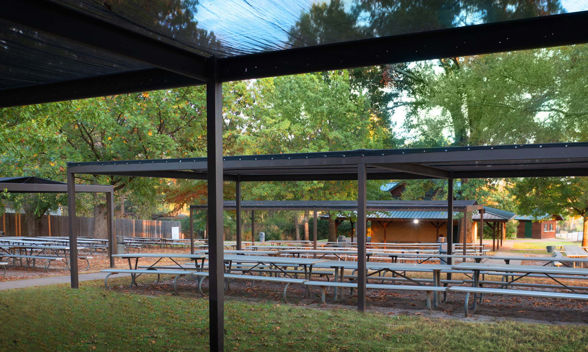 Piney Woods Picnic Area tables with sunscreens